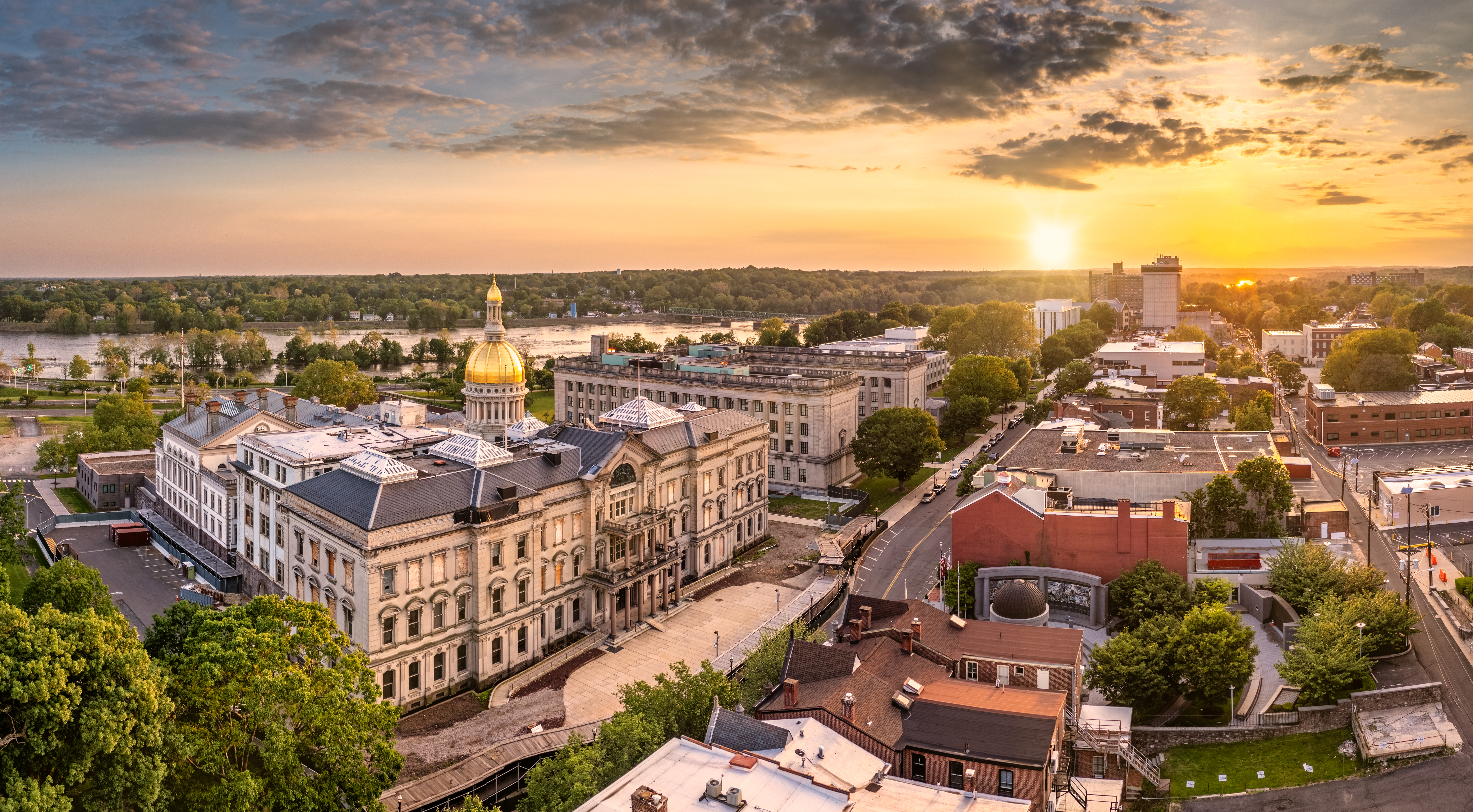 Aerial view of the New Jersey State Capitol and streets in Trenton representing Timothy Abeel New Jersey lemon law attorneys.